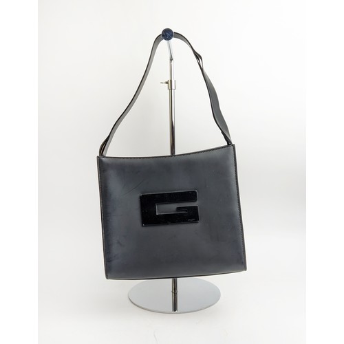 99 - GUCCI TOTE BAG, leather with leather single top handle, front iconic G logo in black, top zippered c... 