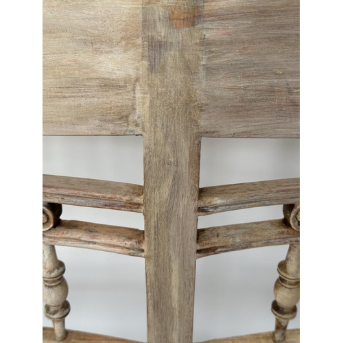 269 - HALL SEAT, Colonial style rail back with cane seat and down swept arms, 107cm W.