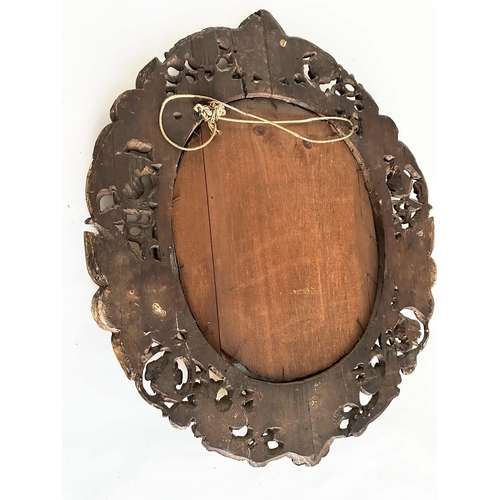 238 - WALL MIRROR, early 19th century Italian carved giltwood oval with carved cherubs and foliate detail,... 