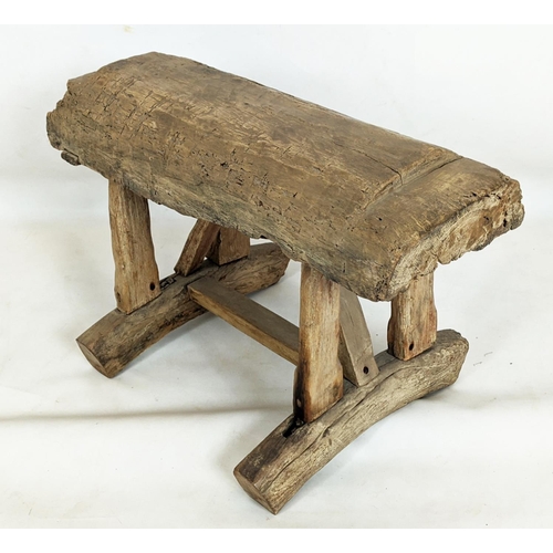 145 - RUSTIC WOODEN STOOL, 60cm W x 43cm D x 48cm H, with vintage Chinese folk textile.