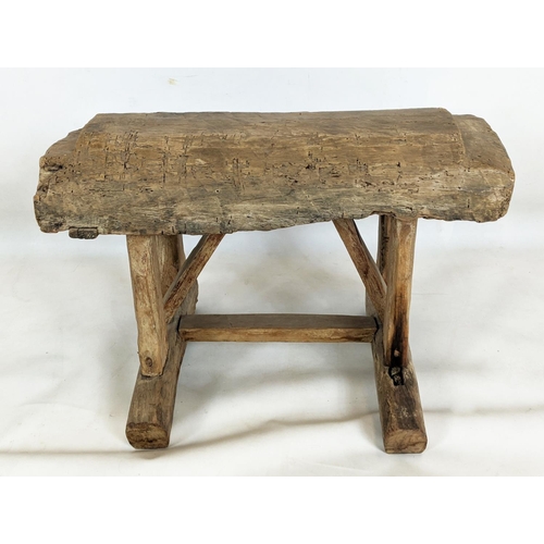 145 - RUSTIC WOODEN STOOL, 60cm W x 43cm D x 48cm H, with vintage Chinese folk textile.