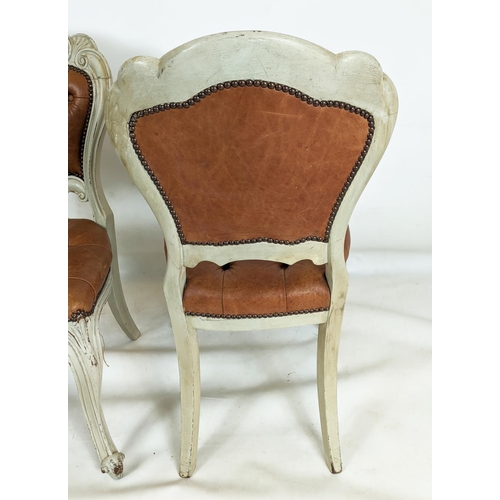 156 - DINING CHAIRS, a set of six, with distressed painted carved showframes and stuffover leather buttone... 