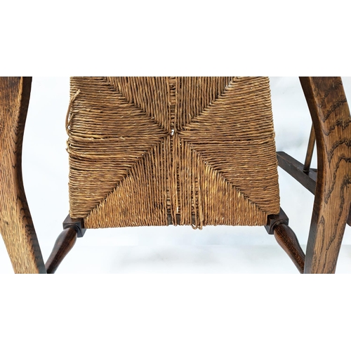 402 - SPINDLE BACK CHAIRS, a set of six, including two carvers, 19th century oak with rush seats, carvers ... 