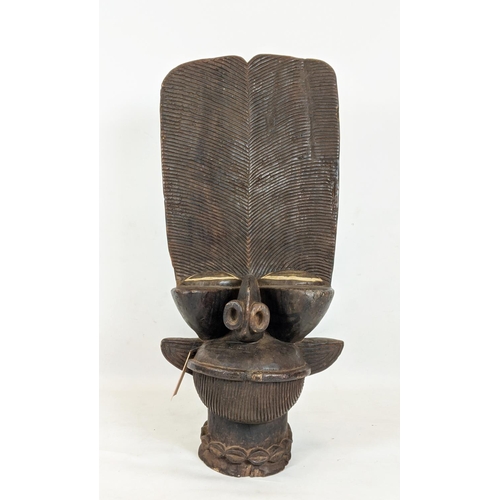 8 - BAMILEKE BATCHAM STOOL (Cameroon), 112cm hH x 55cm L x 40cm W.