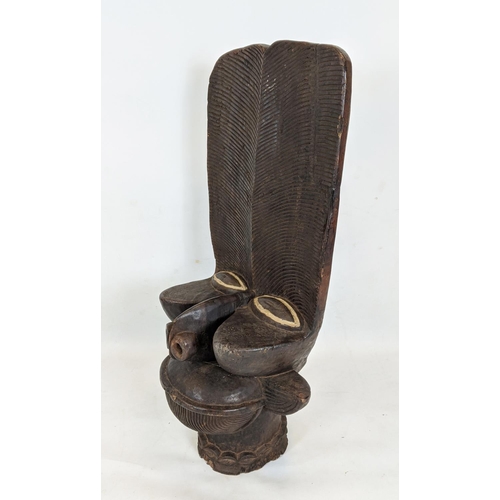 8 - BAMILEKE BATCHAM STOOL (Cameroon), 112cm hH x 55cm L x 40cm W.