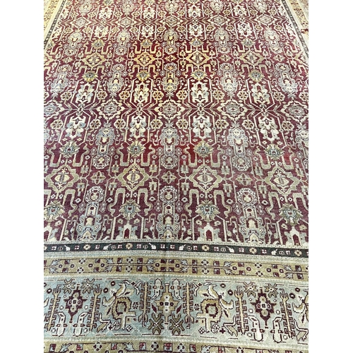 102 - ANTIQUE INDIAN CARPET, 447cm x 361cm.