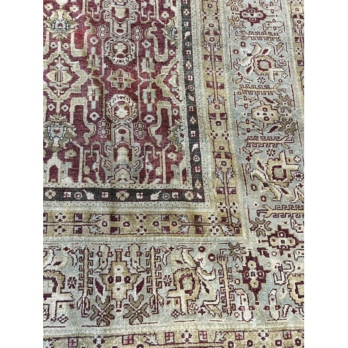 102 - ANTIQUE INDIAN CARPET, 447cm x 361cm.