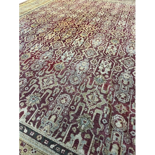 102 - ANTIQUE INDIAN CARPET, 447cm x 361cm.