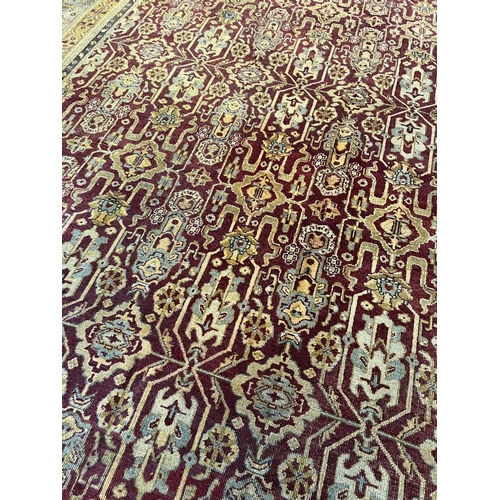 102 - ANTIQUE INDIAN CARPET, 447cm x 361cm.