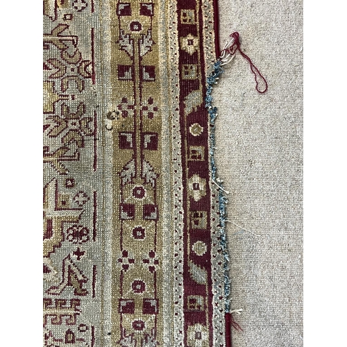 102 - ANTIQUE INDIAN CARPET, 447cm x 361cm.