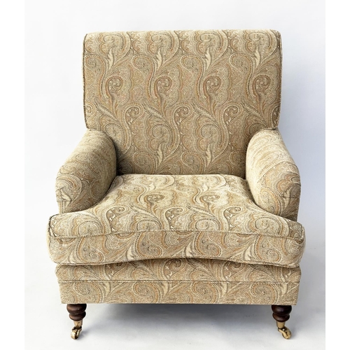 106 - ARMCHAIR, Howard style with Paisley style upholstery and turned front supports, 86cm W.