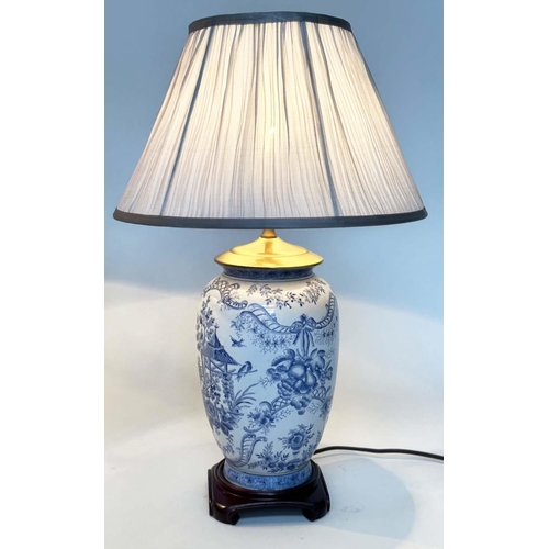 108 - TABLE LAMPS, a pair, Chinese ceramic blue and white toile print, of vase form with wooden bases and ... 