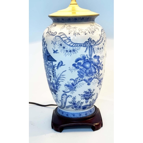 108 - TABLE LAMPS, a pair, Chinese ceramic blue and white toile print, of vase form with wooden bases and ... 