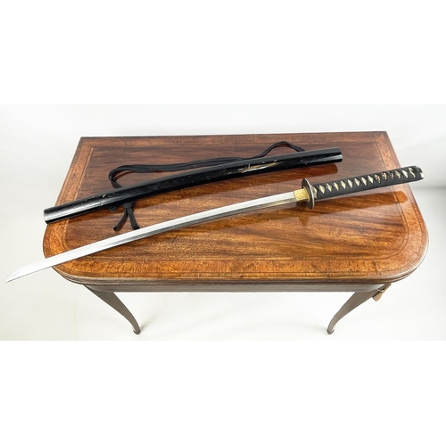 11 - SAMURAI SWORD 'KATANA', with shagreen style grip and black lacquer sheath, 105cm L.