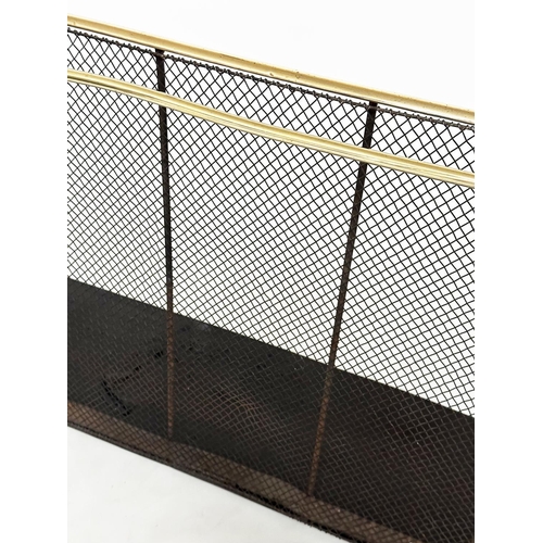 112 - NURSERY FENDER, early 20th century wrought iron and mesh with brass rail fitting, 153cm W x 38cm D x... 