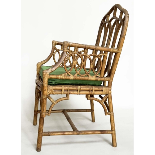 121 - CONSERVATORY ARMCHAIRS, a pair, vintage bamboo, rattan framed and cane bound with Gothic arched back... 