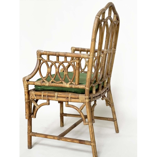 121 - CONSERVATORY ARMCHAIRS, a pair, vintage bamboo, rattan framed and cane bound with Gothic arched back... 