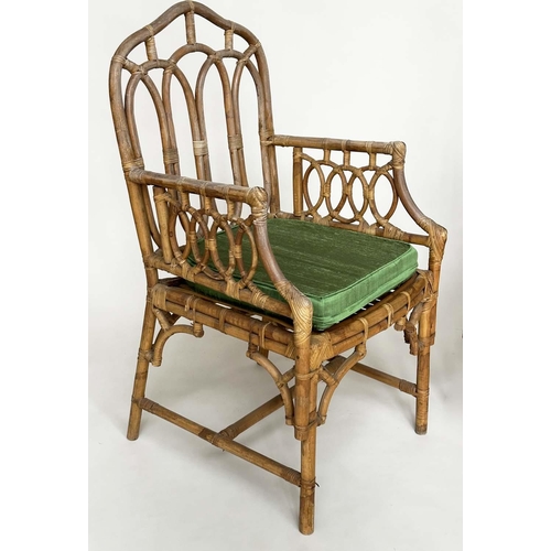 121 - CONSERVATORY ARMCHAIRS, a pair, vintage bamboo, rattan framed and cane bound with Gothic arched back... 