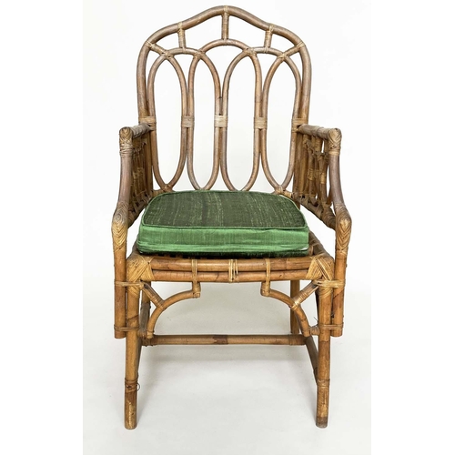 121 - CONSERVATORY ARMCHAIRS, a pair, vintage bamboo, rattan framed and cane bound with Gothic arched back... 