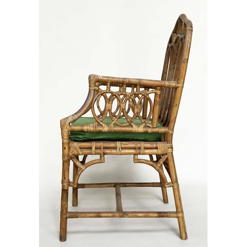 121 - CONSERVATORY ARMCHAIRS, a pair, vintage bamboo, rattan framed and cane bound with Gothic arched back... 