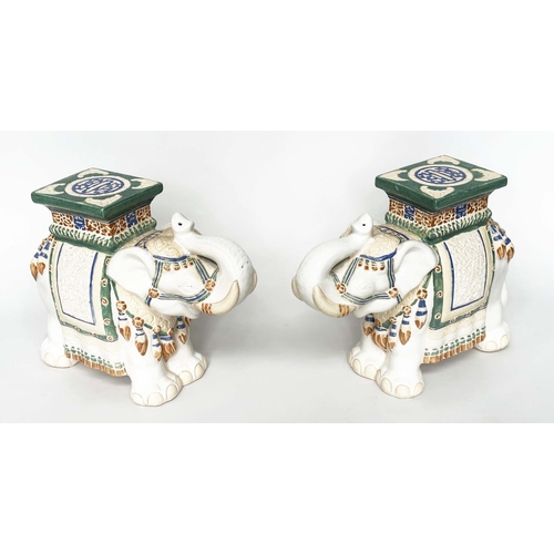 122 - ELEPHANT STOOLS, a pair, Indian ceramic polychrome of elephants in ceremonial regalia with seats. (2... 