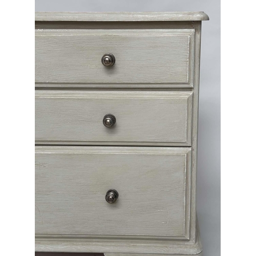 123 - LOW CHEST, George III design traditionally grey painted with an arrangement of eight drawers and bra... 