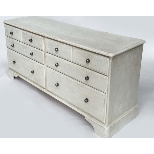 123 - LOW CHEST, George III design traditionally grey painted with an arrangement of eight drawers and bra... 