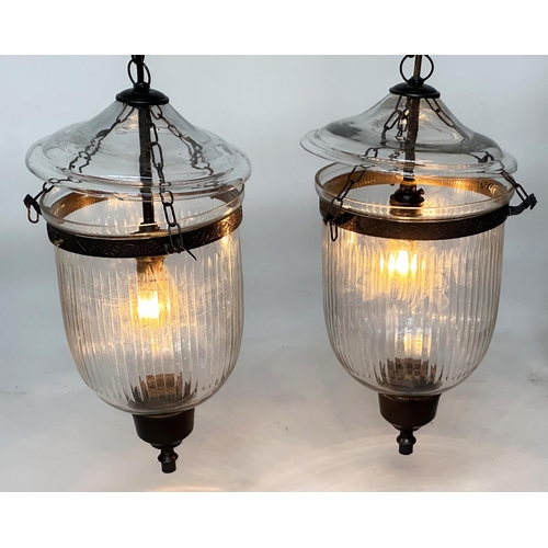 124 - BELL JAR HALL LANTERNS, a pair, glass reeded tapering and bronze style mounted, 58cm H x 34cm W. (2)