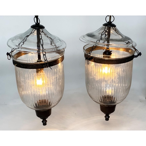 124 - BELL JAR HALL LANTERNS, a pair, glass reeded tapering and bronze style mounted, 58cm H x 34cm W. (2)