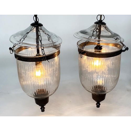 124 - BELL JAR HALL LANTERNS, a pair, glass reeded tapering and bronze style mounted, 58cm H x 34cm W. (2)