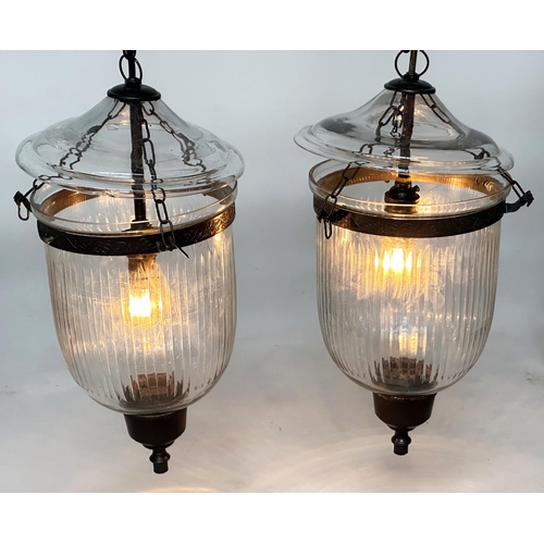 124 - BELL JAR HALL LANTERNS, a pair, glass reeded tapering and bronze style mounted, 58cm H x 34cm W. (2)