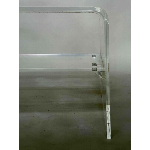 127 - LUCITE LOW TABLE, arched rectangular with undertier, 95cm W x 45cm D x 40cm H.