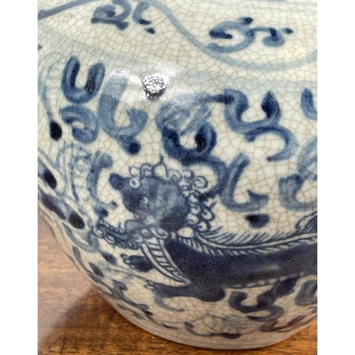 14 - CHINESE VASE, Ming style, blue and white with stylised lions, 12cm H x 12cm.