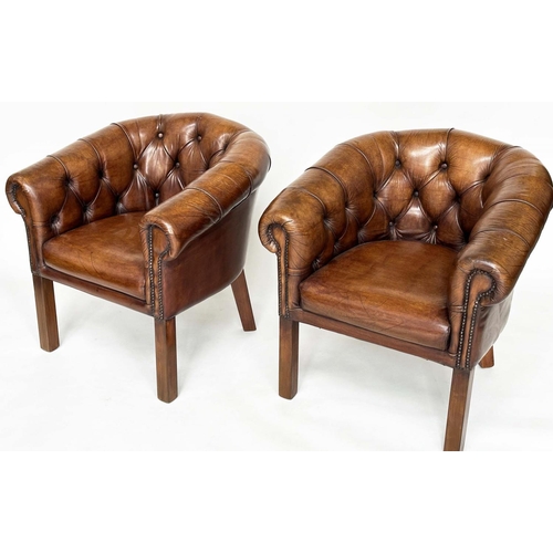 141 - LIBRARY ARMCHAIRS, a pair, club style buttoned soft mid brown leather with curved back and scroll ar... 