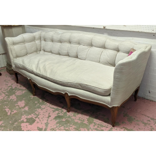 154 - SOFA,200cm W x 75cm D x 80cm H, buttoned with a wavy back, Continental style with carved supports.