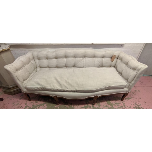 154 - SOFA,200cm W x 75cm D x 80cm H, buttoned with a wavy back, Continental style with carved supports.