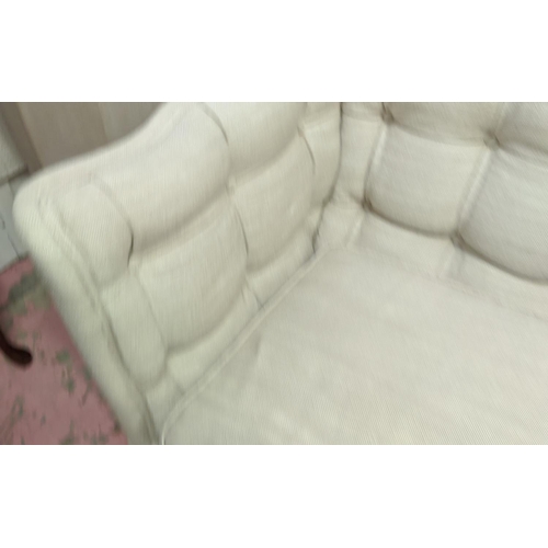 154 - SOFA,200cm W x 75cm D x 80cm H, buttoned with a wavy back, Continental style with carved supports.