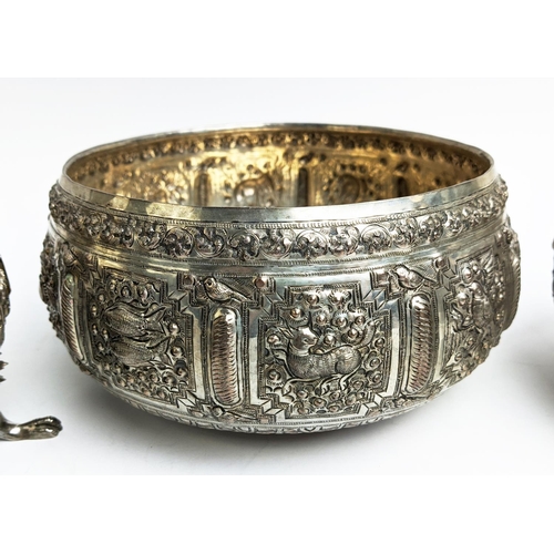 19 - A COLLECTION OF BURMESE/EASTERN SILVER PLATED ITEMS, comprising four heavily embossed bowls and a ju... 