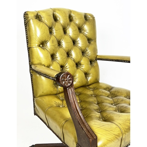 208 - CAPTAINS DESK CHAIR, buttoned green leather on swivel base with brass paw feet and castors, 97cm  H ... 