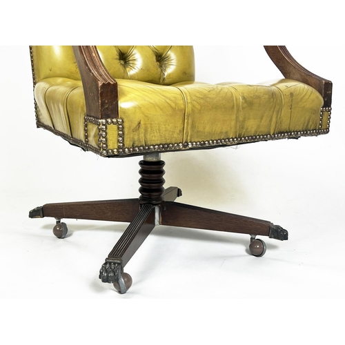 208 - CAPTAINS DESK CHAIR, buttoned green leather on swivel base with brass paw feet and castors, 97cm  H ... 