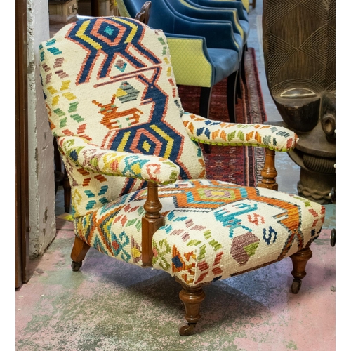 246 - ARMCHAIR, 88cm H x 67cm W, Victorian walnut in kilim upholstery on ceramic castors, back leg stamped... 