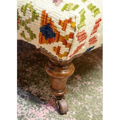 246 - ARMCHAIR, 88cm H x 67cm W, Victorian walnut in kilim upholstery on ceramic castors, back leg stamped... 