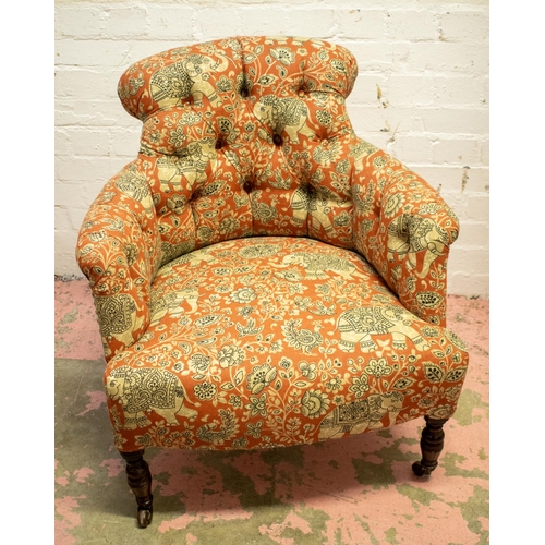 280 - ARMCHAIR, 75cm H x 69cm W, Edwardian in elephant patterned and striped upholstery on front castors.