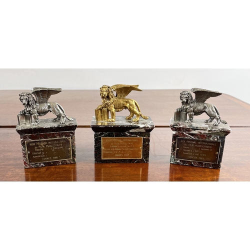 3 - CANNES FILM FESTIVAL TROPHY AWARDS, twelve various dating from the 1970s/80s bronze, silver-gilt and... 