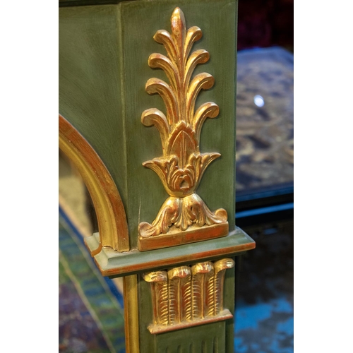 388 - OVERMANTLE, with arched plate in a green painted frame with gilt detail, 92cm x 130cm H.