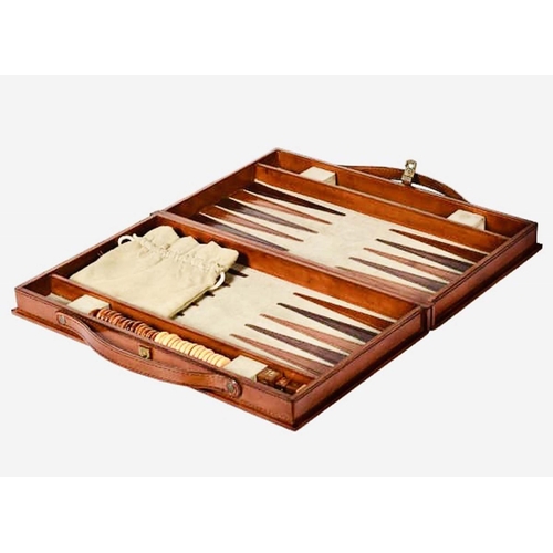 392 - BACKGAMMON SET in brown leathered case, 7cm x 23cm x 40cm.