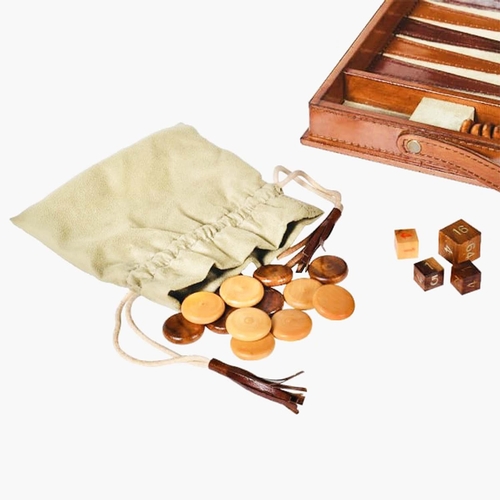 392 - BACKGAMMON SET in brown leathered case, 7cm x 23cm x 40cm.