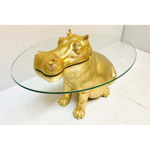 397 - HIPPOPOTAMUS LOW TABLE, gilt resin, glass top, 60cm x 45cm x 50cm.