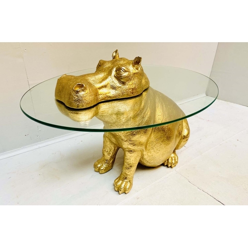 397 - HIPPOPOTAMUS LOW TABLE, gilt resin, glass top, 60cm x 45cm x 50cm.