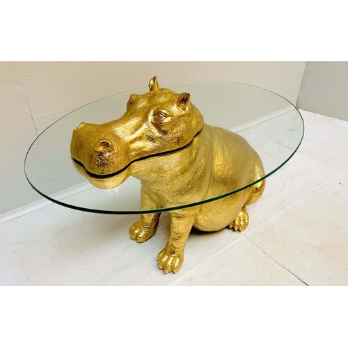 397 - HIPPOPOTAMUS LOW TABLE, gilt resin, glass top, 60cm x 45cm x 50cm.